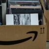 Amazonの段ボール箱に入ったCDの山